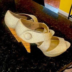 Kaya gold dust cross straps & cork heel.